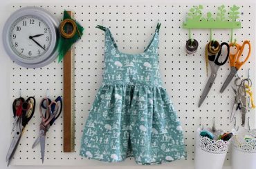 sewing a dress at home